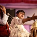Aniruddh Aithal singing at a Swaranjali concert with tanpura and tabla